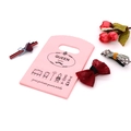 Pink mini plastic gift bag with black Queen Milano print and cut-out handle - No. 23 (Pink Queen Milano)