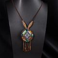 Detail of bohemian beaded necklace with tassel on a black model bust display - X515-1 Style 9