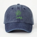 Navy blue washed denim baseball cap with green Lucky text and clover pattern - One Size / Navy Blue