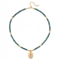 Collier double rang en hématite avec perles de pierre cyan et pendentif ovale doré martelé - Collier en Pierre Naturelle