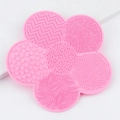 Pink flower-shaped silicone makeup brush cleaning mat with varied scrubbing textures - Deep Pink
