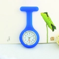 Blue silicone nurse watch with medical cross logo and white dial on a natural background - Dark Blue