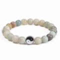 Detail of multi-color 8mm stone beads featuring a silver Yin Yang Tai Chi pendant charm - Amazonite (Tai Chi Pendant)