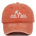 Detailed close-up of palm tree embroidery on a vintage washed brick red baseball cap - Orange