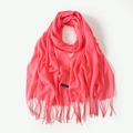 Soft faux cashmere scarf in bright coral color with elegant fringe edges and label - Watermelon red