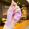 Cute pink Sakura gas bottle liquid glitter keychain with silicone hand strap for bags - Pink Snowflake Gas Tank Shape