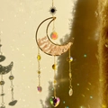 Golden moon sun catcher with pink crystal chips and hanging prisms for garden decor - Rose Quartz Moon Wind Chime