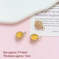 Close-up of three 9x14mm gold-plated durian fruit pendants for DIY jewelry making - Durian
