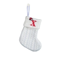 White cable knit Christmas stocking featuring a red embroidered letter X with a Santa hat - White-Letter X