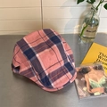 Detail of vintage plaid newsboy cap featuring embroidery and adjustable metal buckle - Pink Plaid