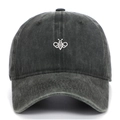 Washed black cotton baseball cap with white embroidered bee design on front crown - Army Green