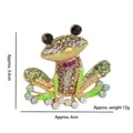Golden frog brooch with green crystals and enamel, measuring 3.6cm by 4cm wide - Golden Frog