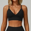 Seamless black V-neck yoga sports bra with thin straps and a wide elastic waistband - Premium Black
