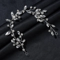 Silver bridal hair vine with marquise rhinestones on elegant black fabric background - Silver Hair Vine / Silver