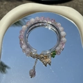Elegant beaded bracelet with purple beads, golden butterfly charm and green leaf detail - S028-purple Gold Butterfly Cheese Milk Tea Bracelet #sz225