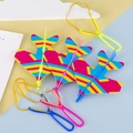 3-pack LED slingshot foam gliders with launchers in vibrant blue, yellow, and pink colors - Printed Slingshot Airplane