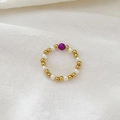 Beaded stretch ring with 18K gold-plated beads, white pearls and a purple stone center - Purple