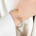 Silver cable cuff bracelet with golden ends and yellow crystal stone in a variant view - Z059-Yellow Zirconia Single Layer