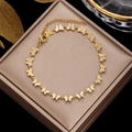 Elegant gold butterfly link bracelet in stainless steel presented on a luxury gift box - Gold Hollow Butterfly Links