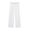 Dettaglio dei pantaloni bianchi a gamba larga a vita alta con piping nero e bottone - S / Bianco (Pantaloni)