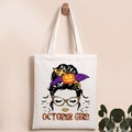 Close-up of Halloween pumpkin skull print and October Girl text on white canvas tote - OCTOBER GIRL Leopard Style