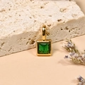 Square emerald birthstone pendant with 18K gold plating on a minimalist stone base - May/Green