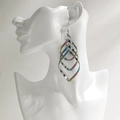 Silver geometric layered twist earrings with vibrant rainbow glitter edges - NRXY-1379-2 Silver Rainbow Glitter