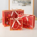 Red Chinese wedding gift paper bags in three sizes with gold handles and bow - Small (Gold Ribbon) / 18x10x16cm