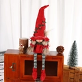 Décoration de gnome de Noël rouge avec motifs en relief et longues jambes rayées de fête - Poupée Sorcière Rouge