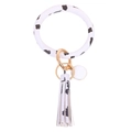 Cow print silicone bracelet keychain with white leather tassel and gold ring clasp - Black and White Spots
