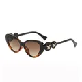 Cat eye sunglasses with gold star detail and gradient lenses shown from a 45-degree angle - Black/Leopard Print