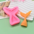 Detailed view of pink silicone mermaid tail mold and finished clay product with scales - Small Mermaid Tail / Pink