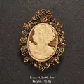 Vintage gold-toned oval cameo brooch with amber rhinestones and profile carving - 4.3x5.8cm / Coffee (XD7358)