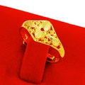 Elegant gold-tone open ring featuring intricate floral patterns on a red velvet stand - Hollow Flower Style (J111511)