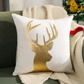 White Christmas pillow cover with golden elk deer silhouette on a green velvet sofa - White Bronzing Reindeer/White