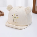 Détail de la casquette bébé en coton beige avec broderie soleil et oreilles douces - 46-48 cm (6-15 Mois) / Jaune