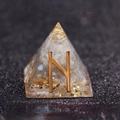 Resin pyramid paperweight with gold foil and crystal, featuring letter N character - Hurricane - Clear Negative Energy