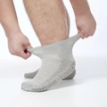 Gray diabetic socks for men and women featuring non-slip grippers and elastic cuff - Light Gray