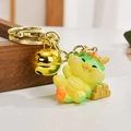 Cute Siamese dragon keychain in green and yellow gradient on gold ingot with large bell - Gold-lying Dragon Style