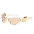 Gafas de sol rosa corazón Y2K con montura transparente y detalles de corazón - Montura Champaña Lente Té Claro