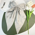 Silver-grey oversized satin bow hair clip with long ribbons and elegant silk texture - Gray