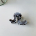 Minimalist wave hair claw clip in gradient grey transparent finish on white background - Ink Grey