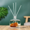 Reed diffuser set with dried citrus slices and cinnamon stick in a square glass bottle - Lemon - 100ml