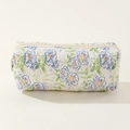 Close-up of quilted floral cotton fabric with blue flowers and a sturdy zipper closure - Blue Flower