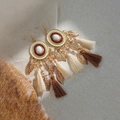 Detail of bohemian tassel earrings with gold leaf charms and multi-color beaded accents - Gold and Brown Tassel Style(E6308)