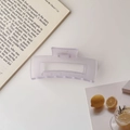 Detail of a large frosted translucent purple hair claw clip in a lifestyle setting - Frosted Square Mauve / 8.5cm