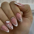 Detail of almond press-on nails with white French tips, floral patterns and silver glitter - French White Edge 3D Flower Style (DW73)