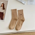 Light brown ribbed cotton crew socks featuring dark bee embroidery in a stylish flat lay - One Size / Khaki