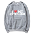 Light gray sweatshirt with I Love My Boyfriend print in flat lay view - Light Grey Slogan
