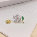 Elegant gold-plated flower brooch with lilac crystal petals and a green leaf detail - Gold Five-Petal Flower (90161H)
